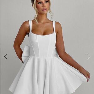 Elegant White Mini Dress with Bow Accent
